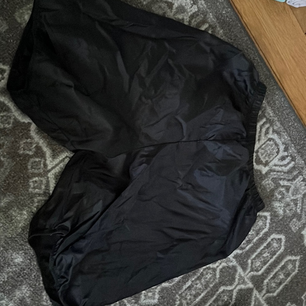 MINIMALLY WORN black capezio warm up trash bag shorts size small adult.